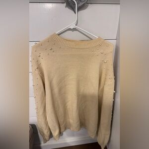 Elegant Cream Sweater with Pearl Detailing